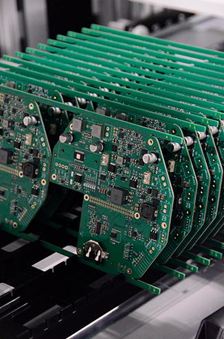 Stack of PCBs on a rack